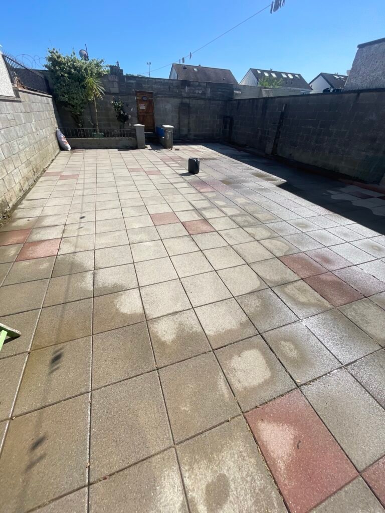Paved patio after weed removal and cleaning